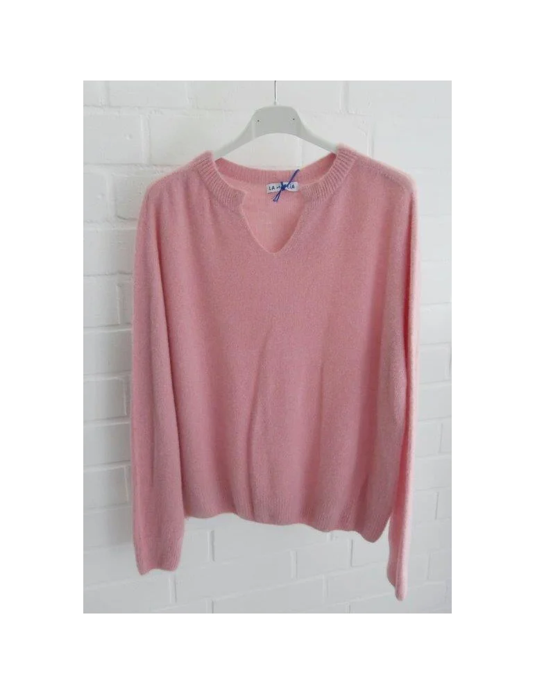 Weicher rosa Pullover mit V-Schlitz am Rundhalsausschnitt Weicher rosa Pullover mit V-Schlitz am Rundhalsausschnitt