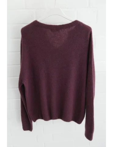 Rückansicht Weicher rosa Pullover mit V-Schlitz am Rundhalsausschnitt