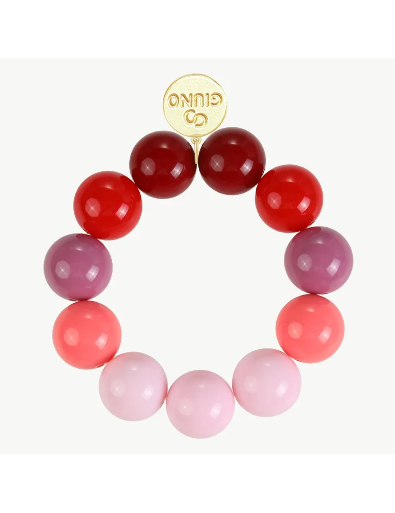 Farbenfrohes Armband aus glänzenden roten, rosa, korallenfarbenen und lila Kugeln