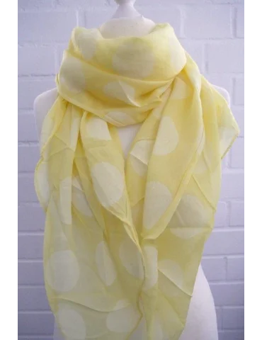 Gelber Schal mit weißen Riesenpunkten auf einem Torso