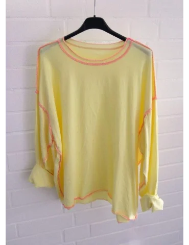 Damen Oversize Longshirt in Gelb mit pinken Ziernähten im Inside-out Look