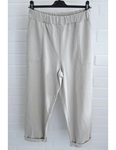 Beige Stoffhose mit elastischem Bund und lockerem Schnitt