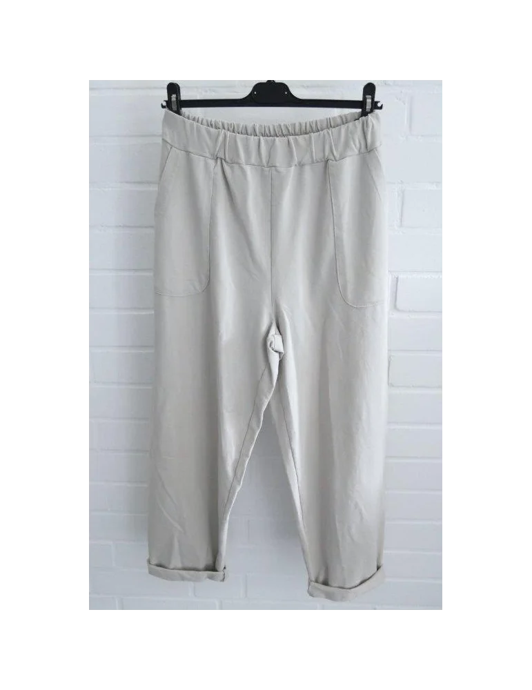 Beige Stoffhose mit elastischem Bund und lockerem Schnitt
