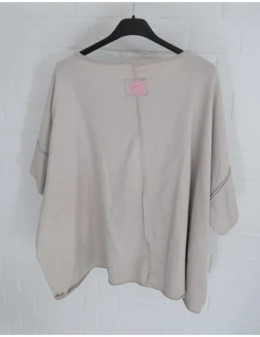 Rückansicht Beiges locker sitzendes Oversize-Shirt auf einem Kleiderbügel