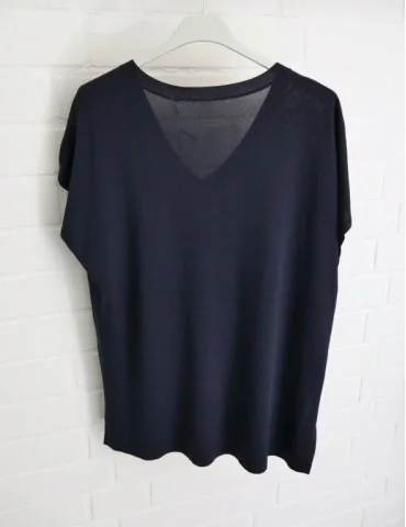 Rückansicht Ärmelloses Strick Shirt mit V-Ausschnitt in dunkelblau. Seitlich Schlitze unten