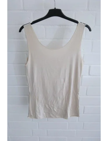 Rückansicht Nahtloses Damen Tanktop in Beige mit Rundhalsausschnitt auf einem Kleiderbügel
