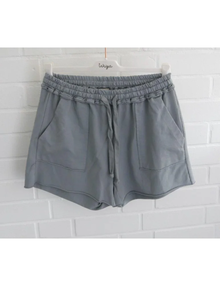 Graue Damen Sweat-Shorts mit elastischem Bund und Kordelzug auf weißem Bügel