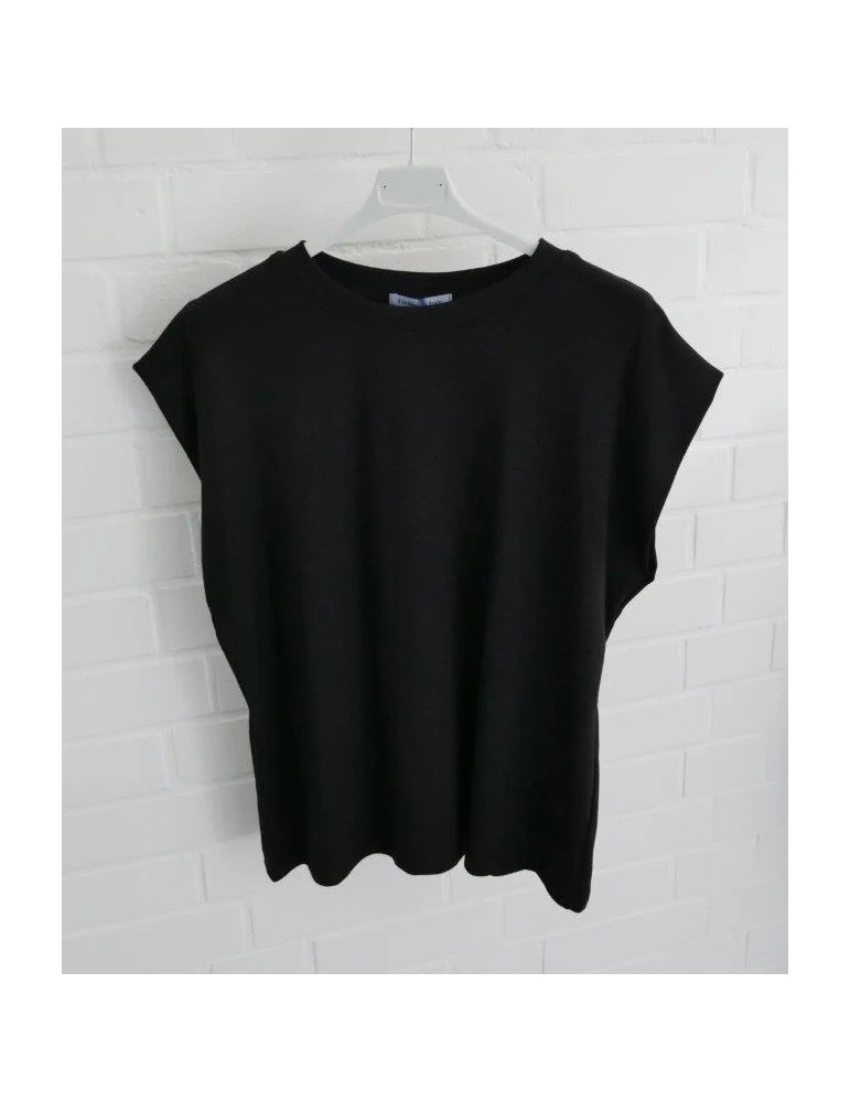 Schwarzes Damen T-Shirt aus weichem Baumwoll-Lyocell-Mix auf weißem Kleiderbügel