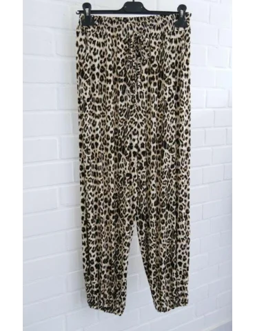 Bequeme Damen-Hose mit Leopardenmuster und Kordelzug auf Kleiderbügel