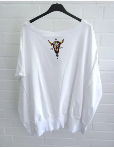 Rückansicht Weißes Oversize-Shirt mit buntem Motiv-Print auf der Rückseite