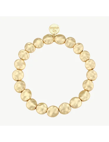Goldfarbenes Armband mit Plättchen vor weißem Hintergrund