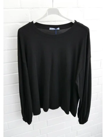Schwarzes Oversize-Longsleeve für Damen mit Ballonärmeln und Bündchen auf Bügel