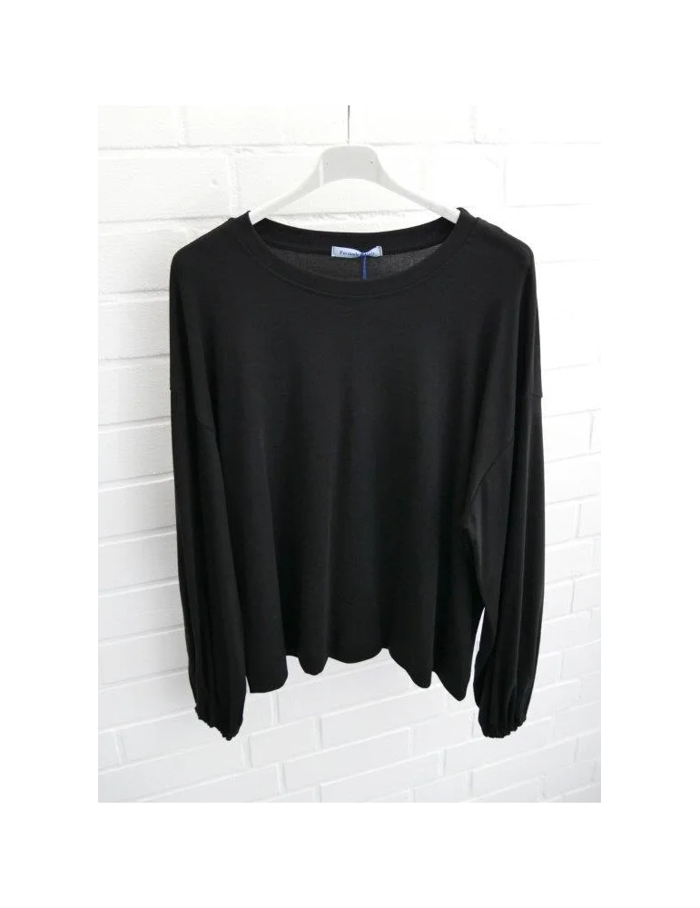 Schwarzes Oversize-Longsleeve für Damen mit Ballonärmeln und Bündchen auf Bügel