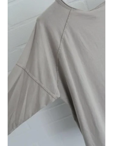 Nahaufnahme Ärmel des beigen Longsleeves