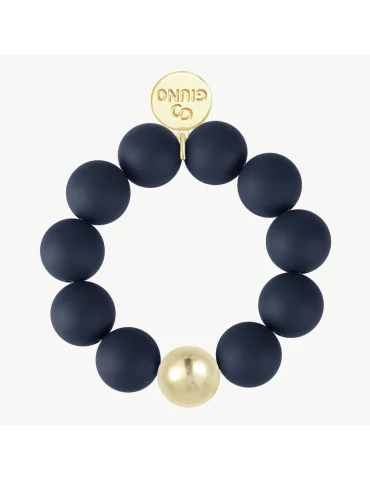 Armband mit dunkelblauen, matten Kugeln und einer goldfarbenen Kugel