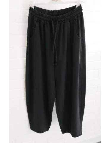 Schwarze Damen-Sweatpants im weiten Barrel-Leg-Schnitt mit Kordelzug auf Bügel