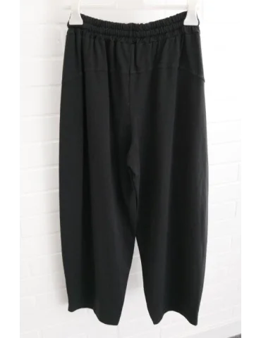 Rückansicht Schwarze Damen-Sweatpants im weiten Barrel-Leg-Schnitt mit Kordelzug auf Bügel