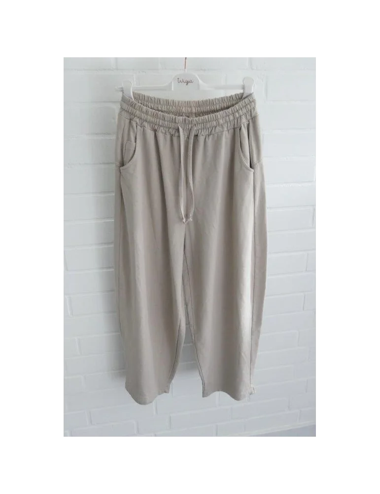 Beige Damen-Sweatpants im weiten Barrel-Leg-Schnitt mit Kordelzug auf Bügel