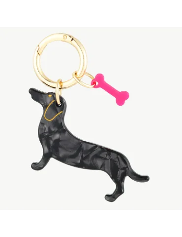Schlüsselanhänger schwarzer Dackel mit kleinem Knochen extra in pink an einem goldfarbenen Ring