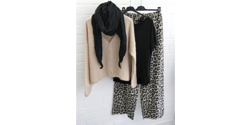 Trendiges Leo vs. kuschelige Strickjacke